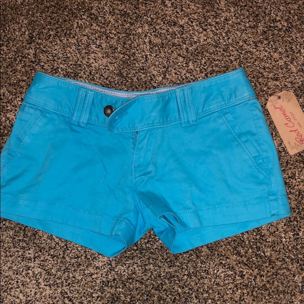 Blue khaki shorts. NEVER WORN!!